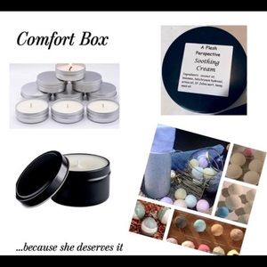 Comfort box includes a candle a bath bomb and soothing cream for period relief